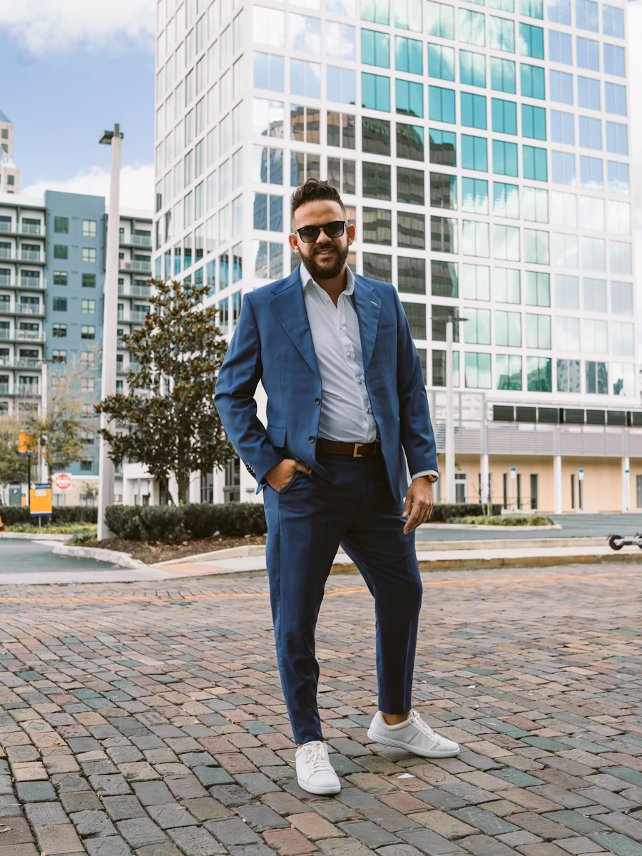 A building manager in front of the blocks he looks after